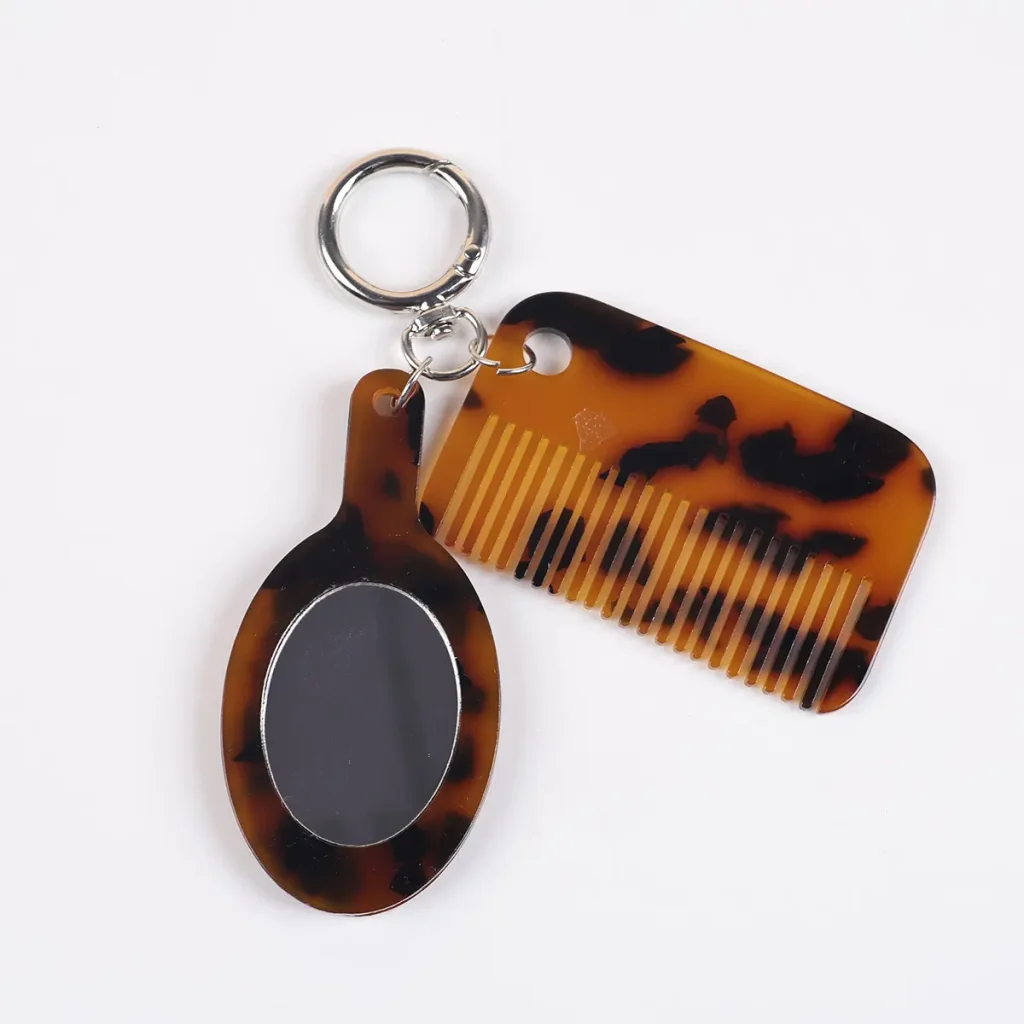 Tortoise Shell Acetate Hair Comb And Mirror Keychain Detail View