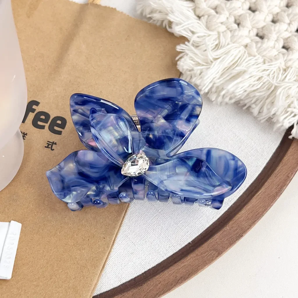 blue-flower-cellulose-acetate-hair-claw-clip-lifestyle.jpg