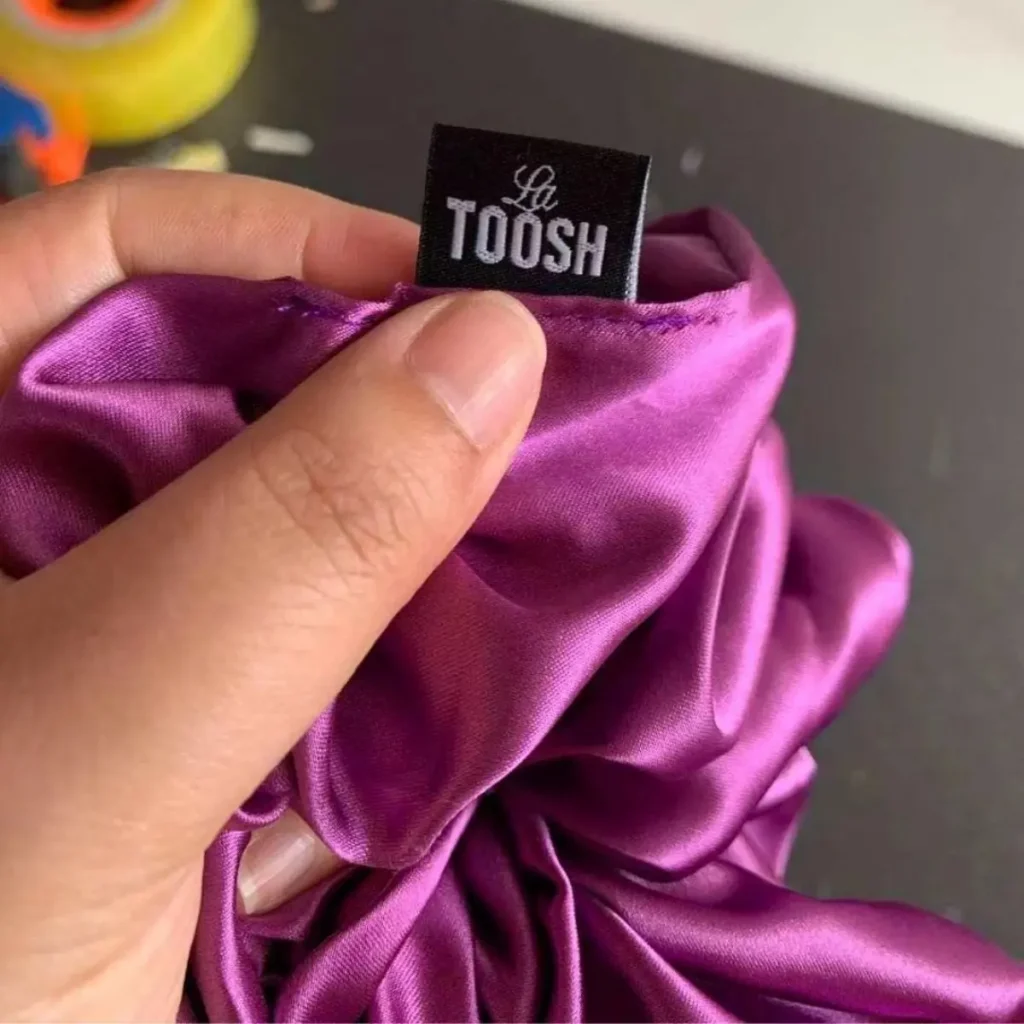custom logo woven label satin hair scrunchie detail