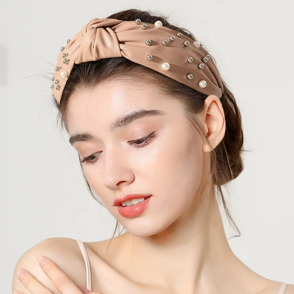 Nude Faux Leather Pearl Stud Bow Headband Model Wearing